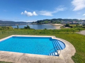 Apartamento encima del mar, piscina y terraza